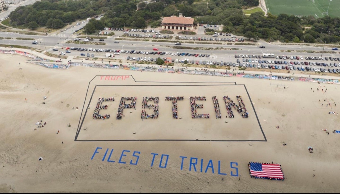 Banner of bodies on S.F.’s Ocean Beach sends Trump a pointed birthday…